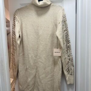 Cream long sleeve turtleneck neck sweater dress 
Sequins detail on sleeves